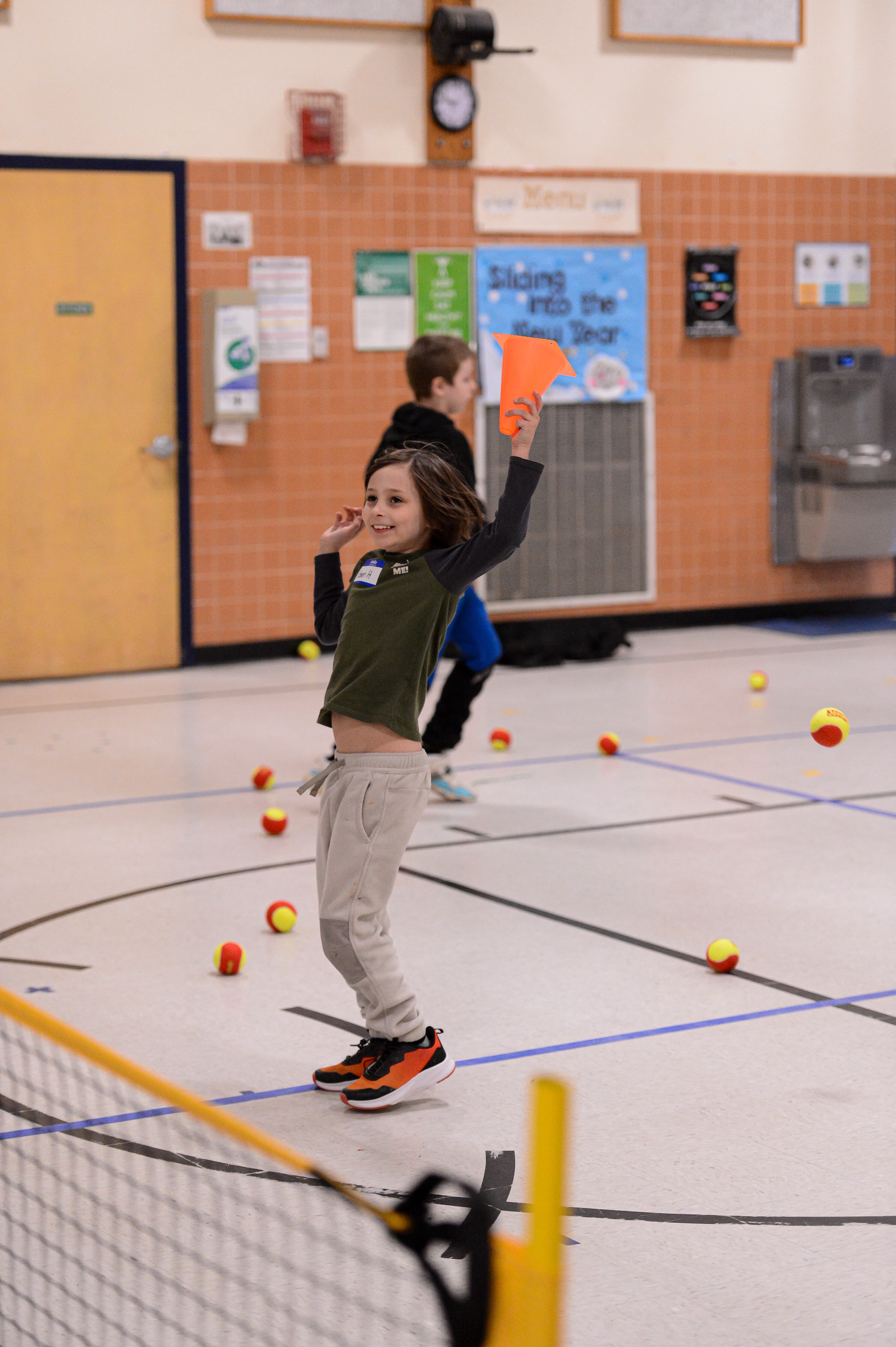 CourtBloom youth tennis photo — CourtBloom InAction 12