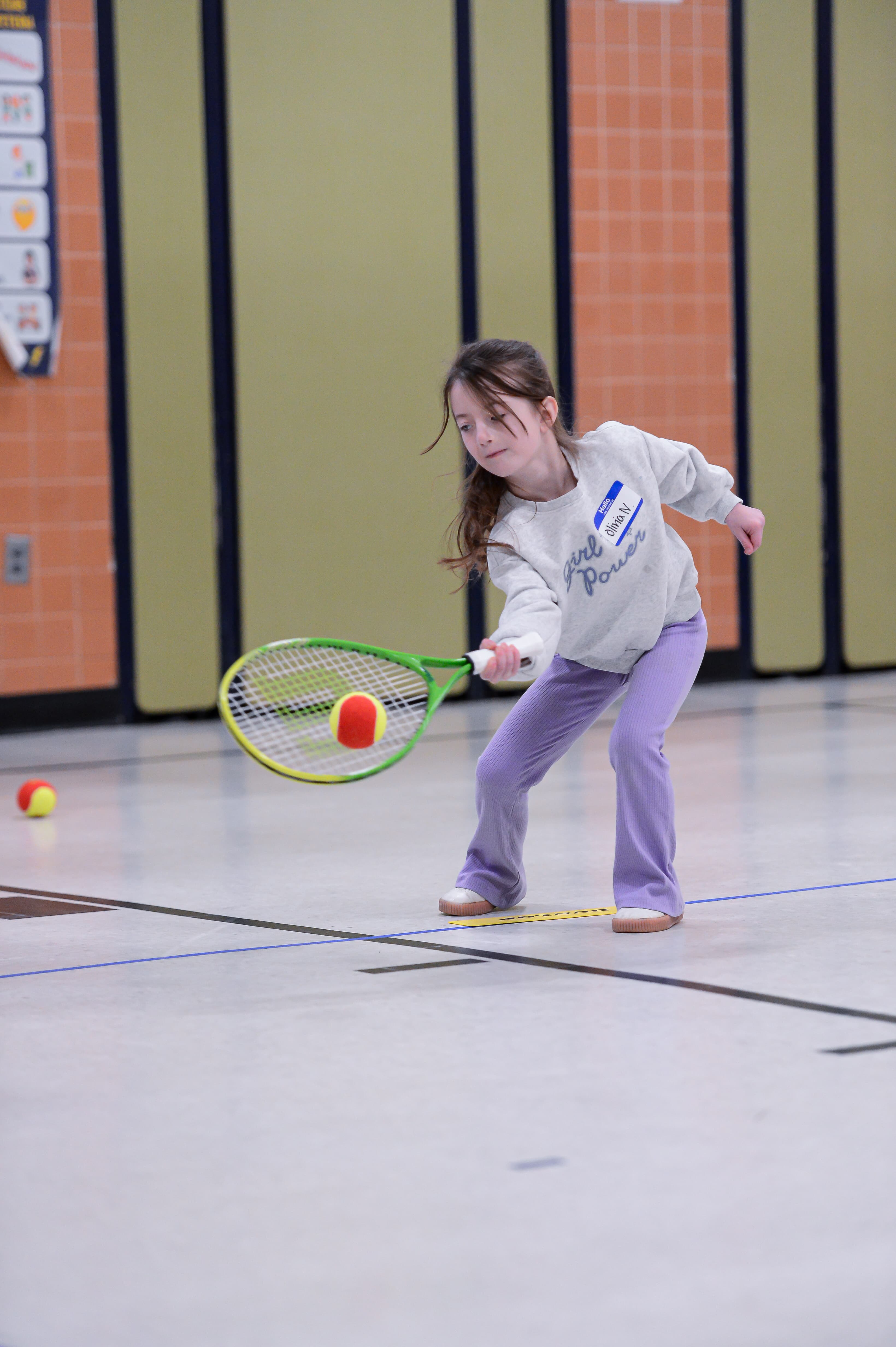 CourtBloom youth tennis photo — CourtBloom InAction 7