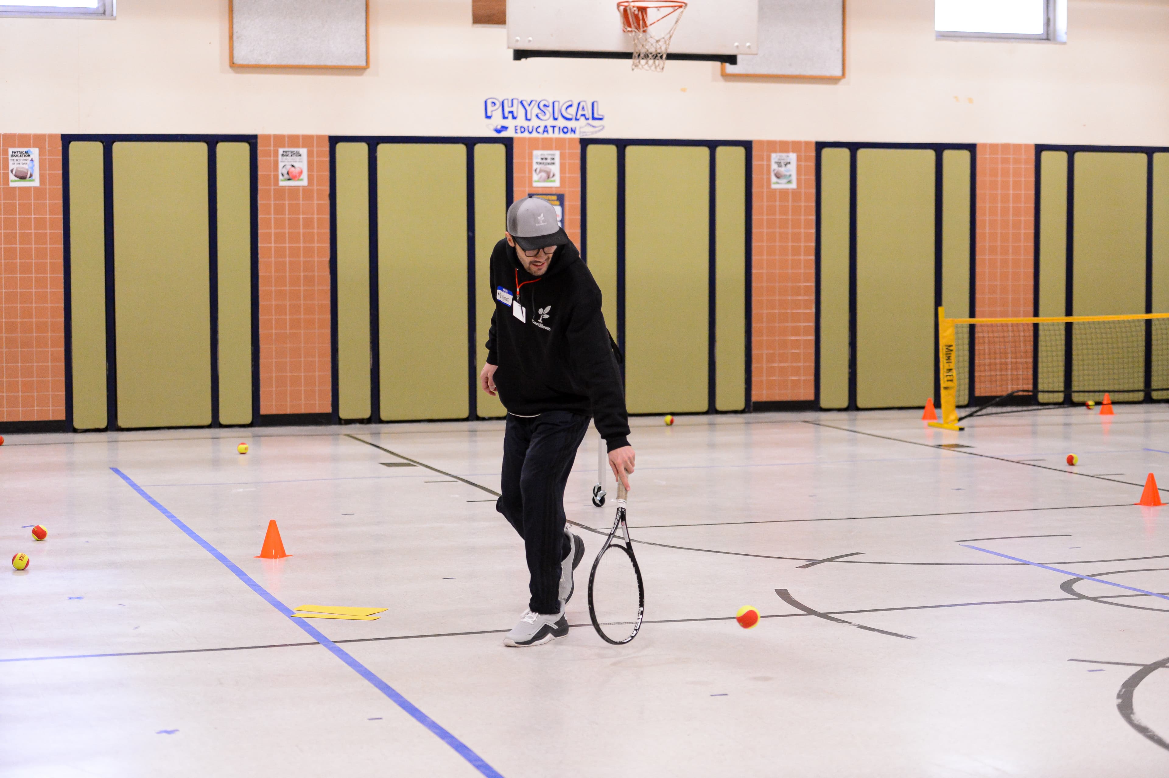 CourtBloom youth tennis photo — coach rally