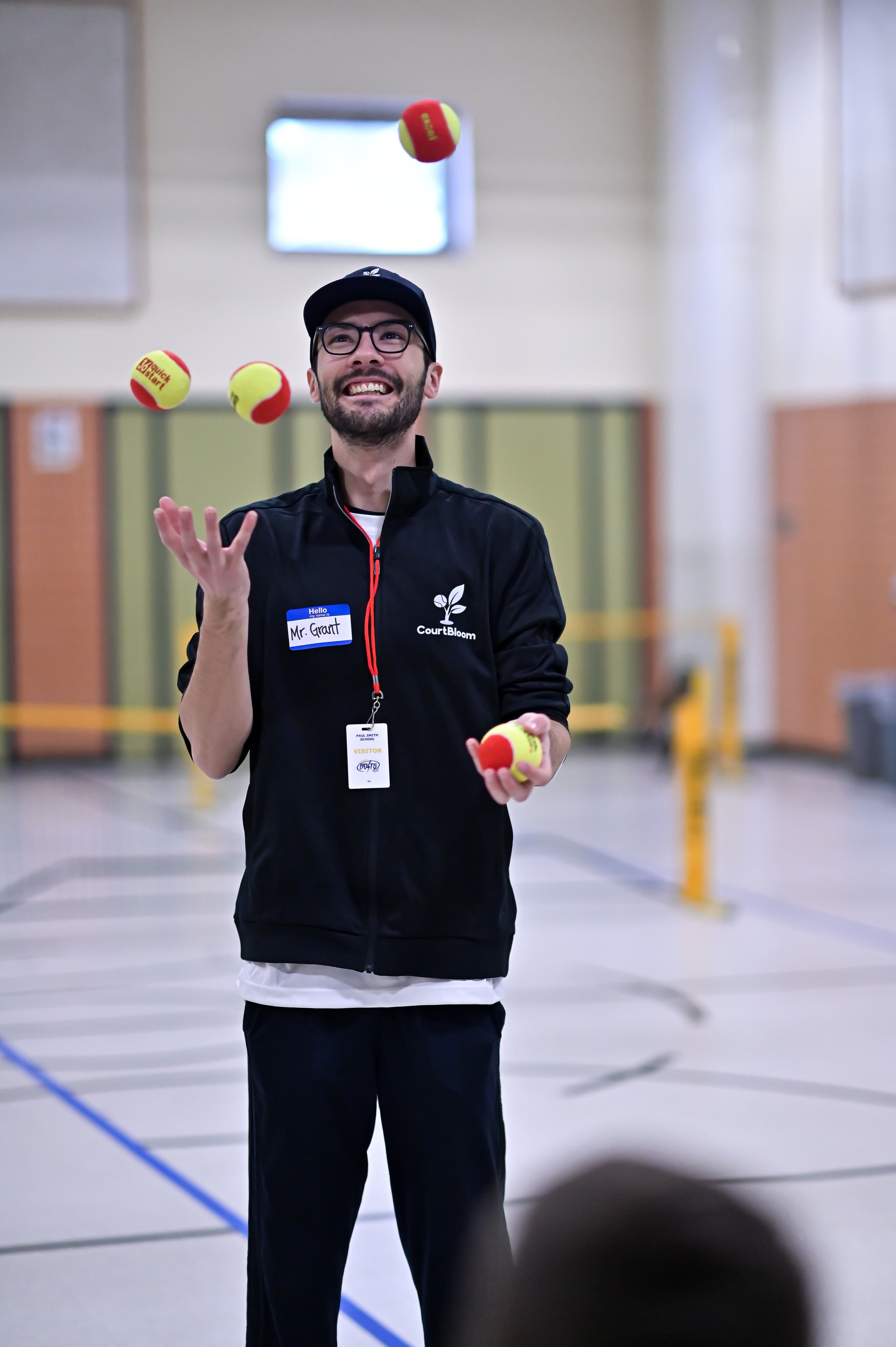 CourtBloom youth tennis photo — juggling photo